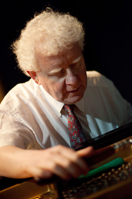 Philip Kennedy tuning a piano for the Hay Festival