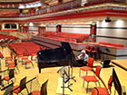 Phil preparing a concert grand piano at Symphony Hall, Birmingham, for an orchestral concert